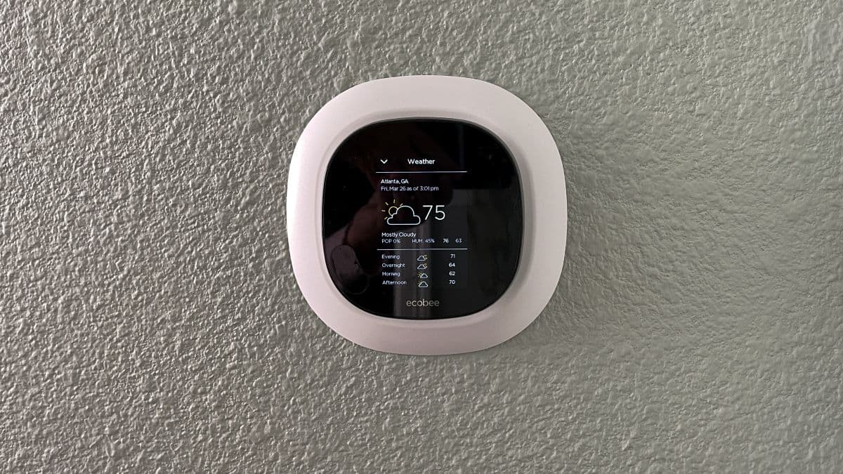 An Ecobee smart thermostat in a home.