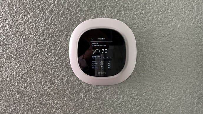 An Ecobee smart thermostat in a home.