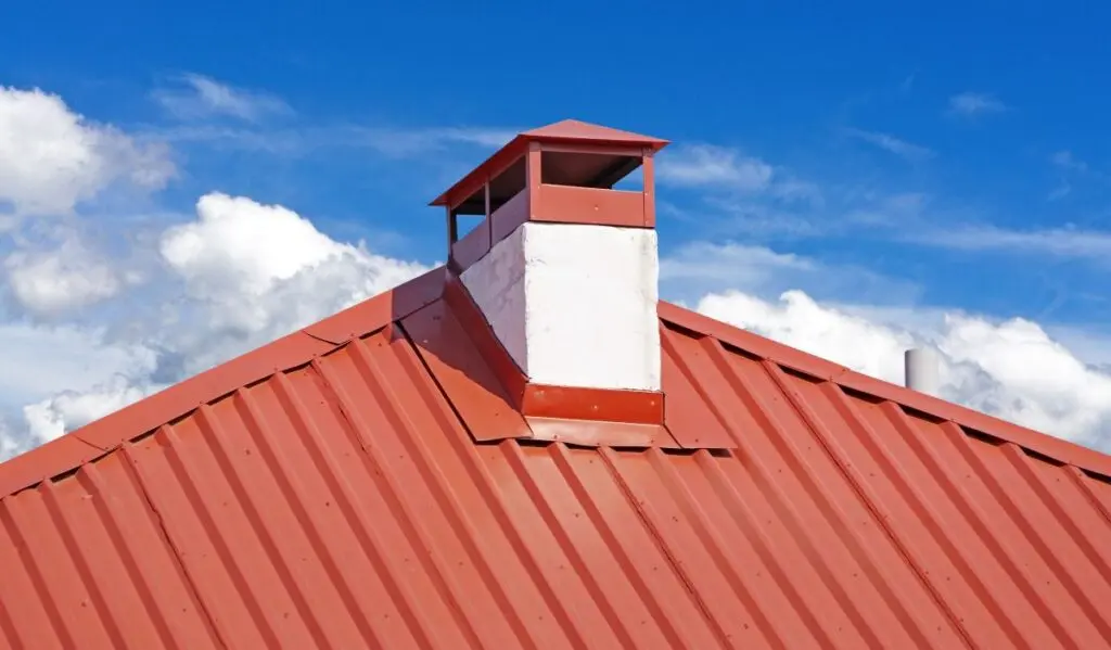 metal roof with a chimney and flashing