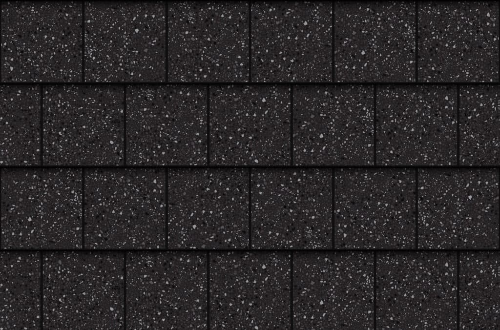 Dark gray asphalt roof shingles arranged in neat, overlapping horizontal rows. The shingles have a rough, speckled texture with lighter gray and white granules scattered across the surface.