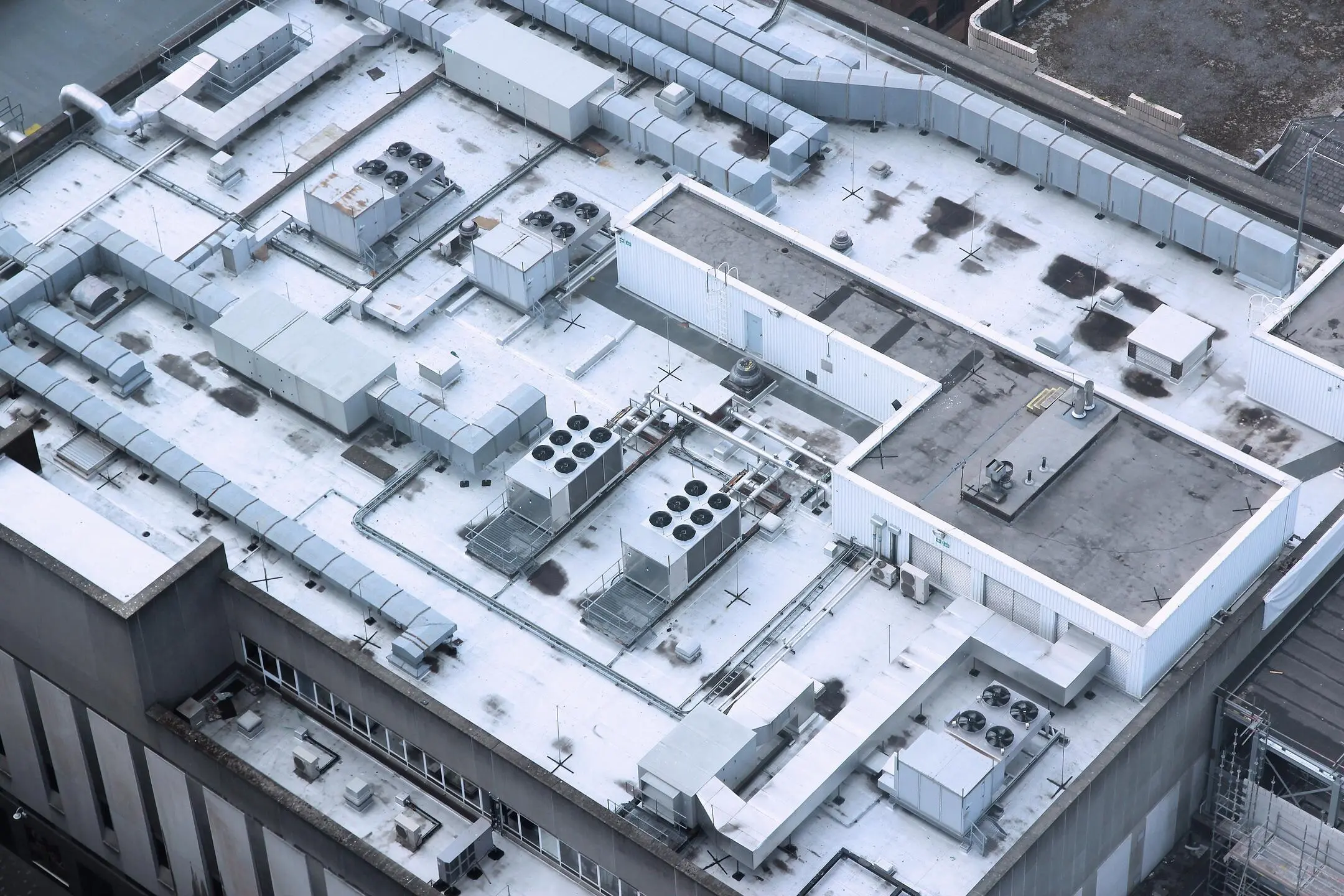 commercial roofing deforest-aerial view of white commercial roof
