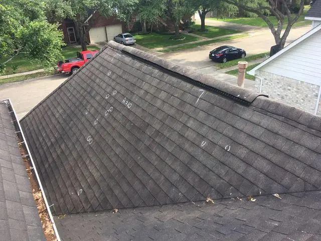 shingle roof with hail damage
