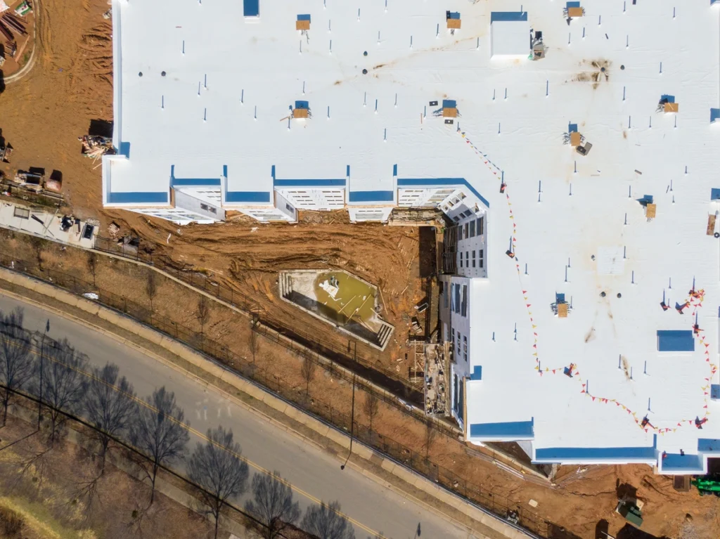 commercial roofing stoughton large white commercial building