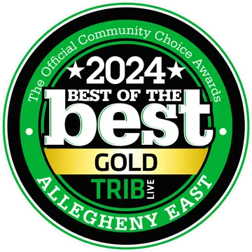 A circular emblem with a green border reads: "The Official Community Choice Awards." Central text states "2024 Best of the Best Gold" with "Trib Live" beneath. Bottom text in the border says "Allegheny East.