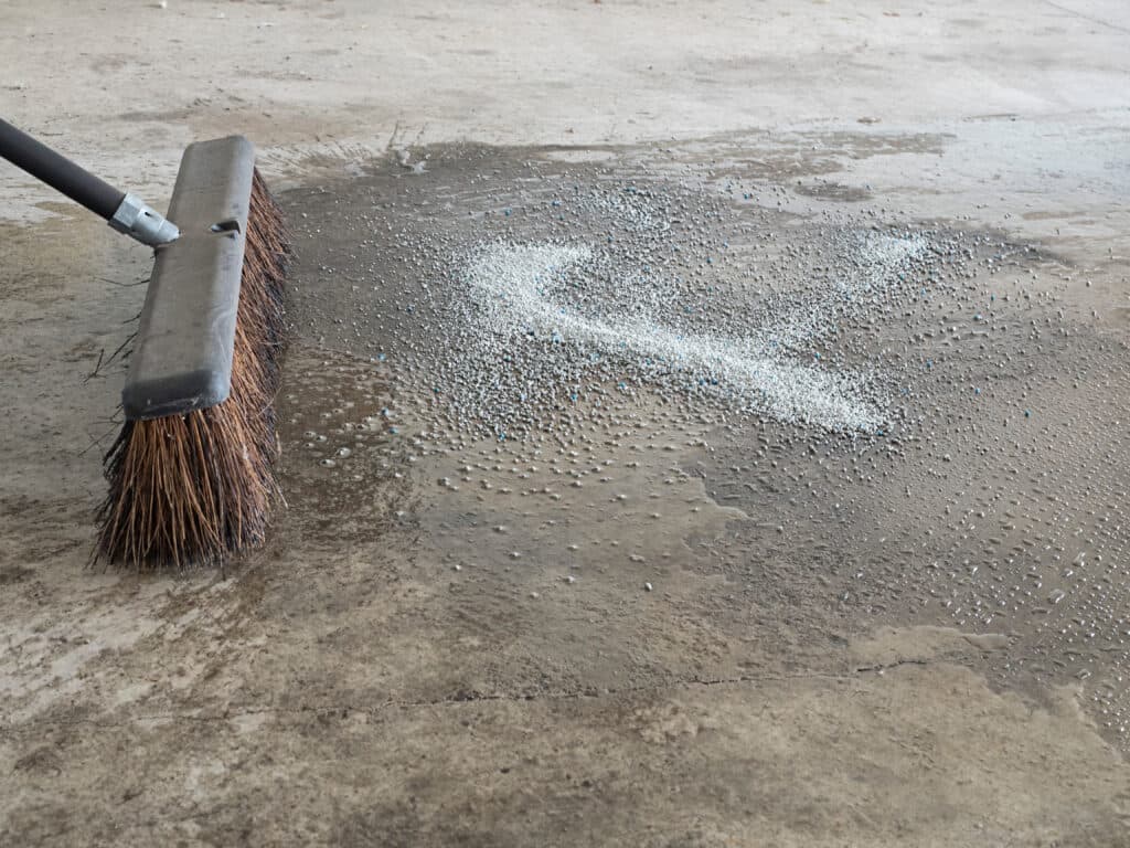 broom on garage floor