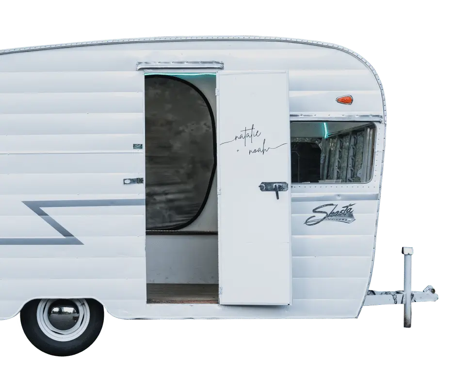 old white camper turned into retro photo booth