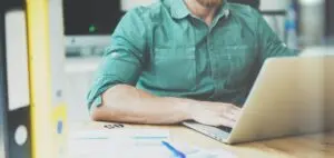 Image of man with a laptop