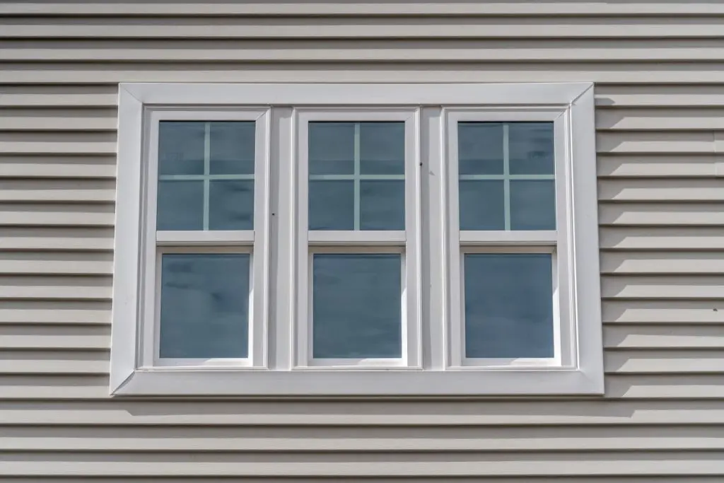 white window on a beige wall