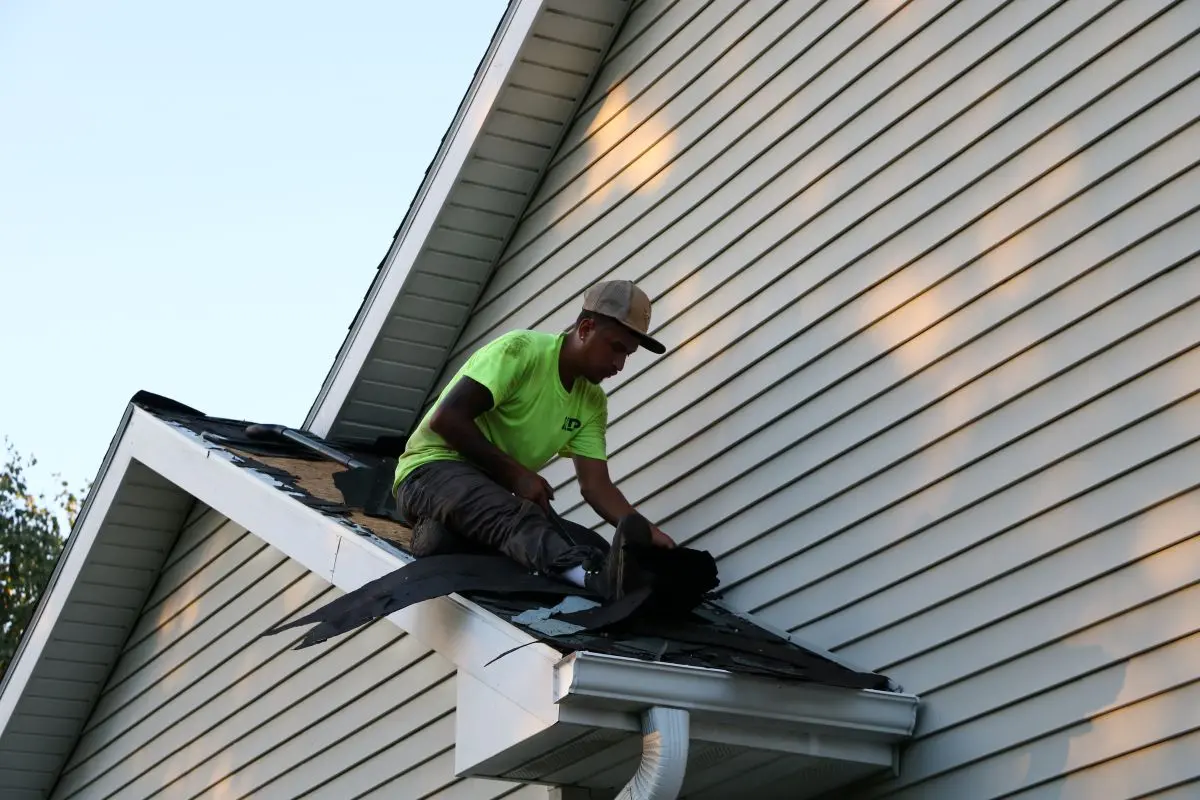 First Fruits inspecting a roof