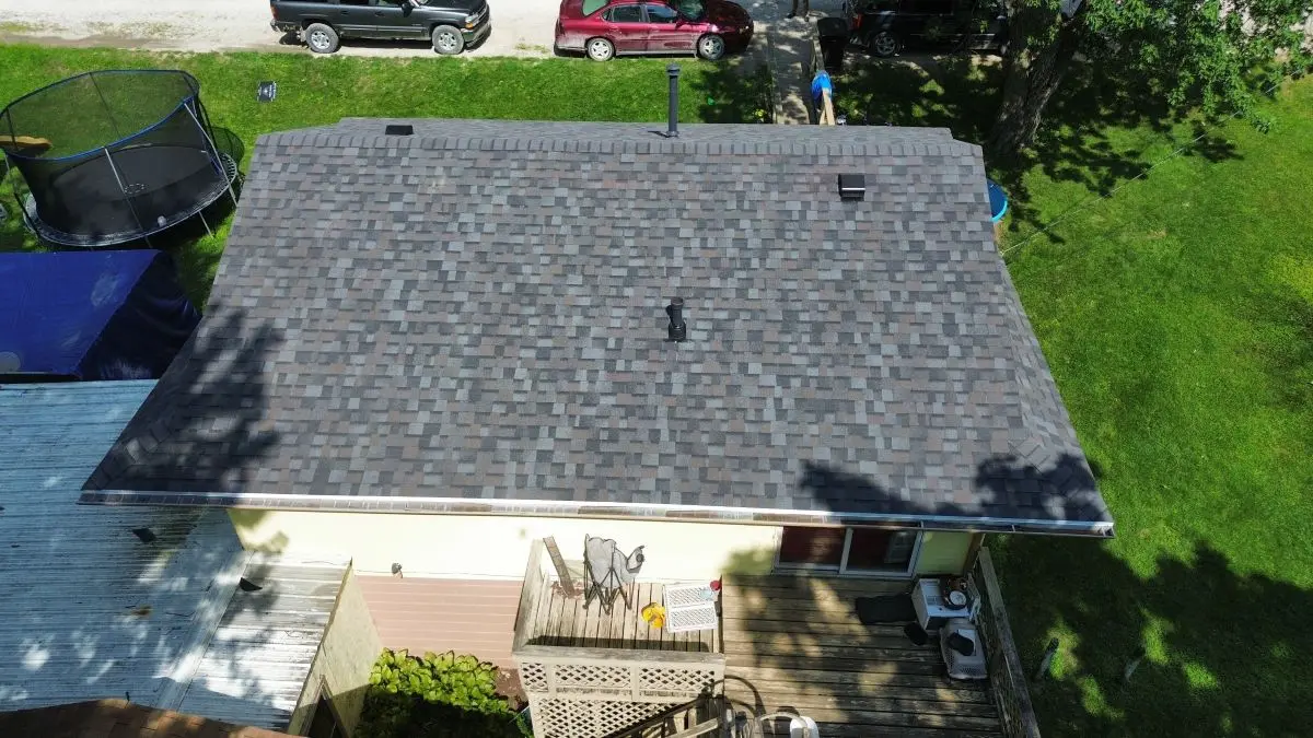 Drone view of a grey shingle roof