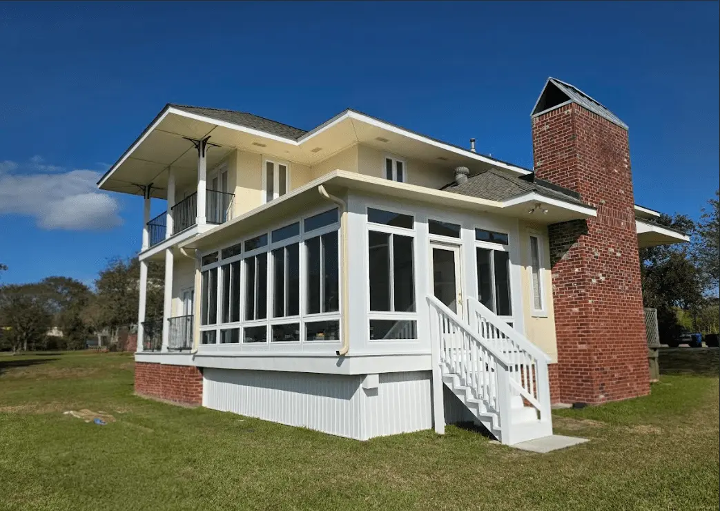 Newly installed sunroom addition on a New Orleans home, showcasing Capital Improvement's patio enclosure services