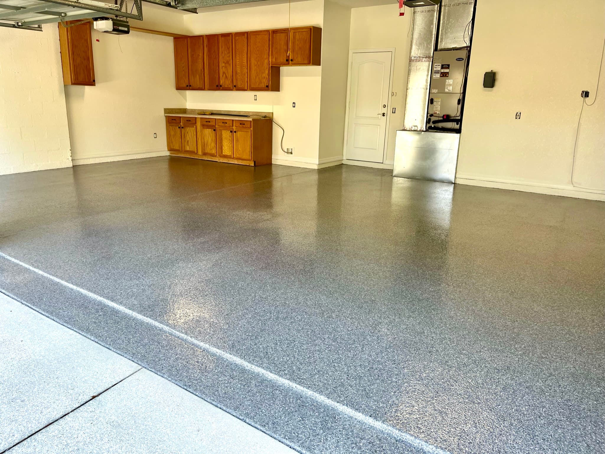 Sarasota residential garage floor coated by DecoCrete Services