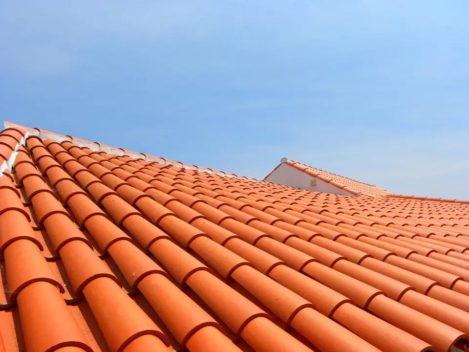 metal roof vs tile roof-close up of terracotta tiles on roof