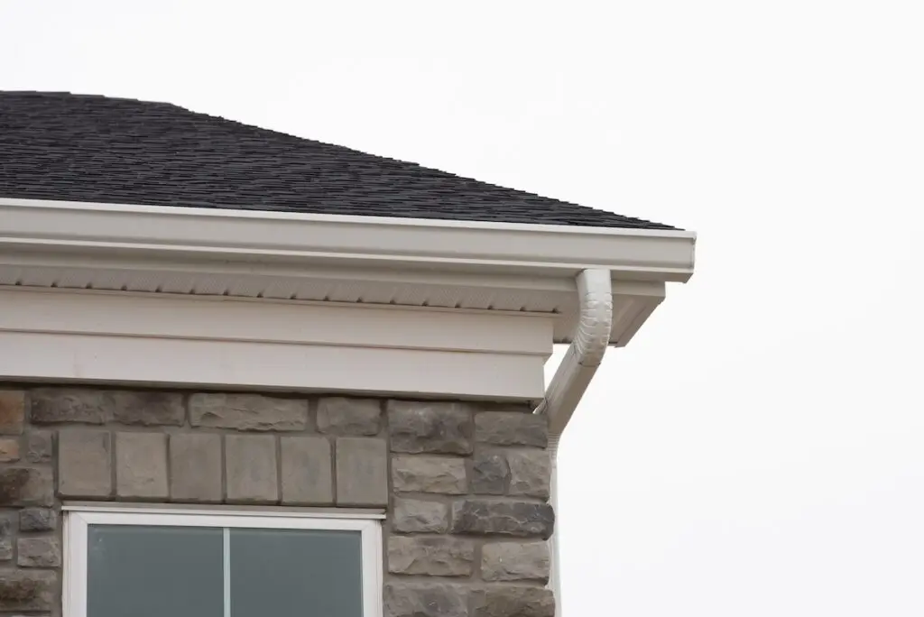 stone house white soffit and fascia