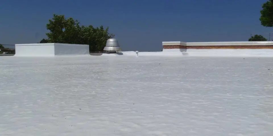 spray foam roofing-large commercial roofing after new spray foam roofing was installed