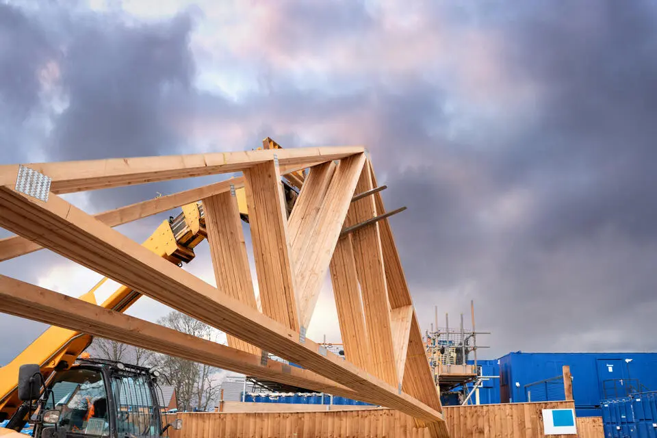 roof trusses-trusses being installed during home construction