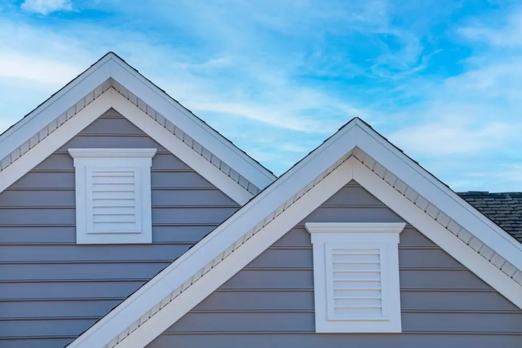 gray siding white soffit and fascia roof