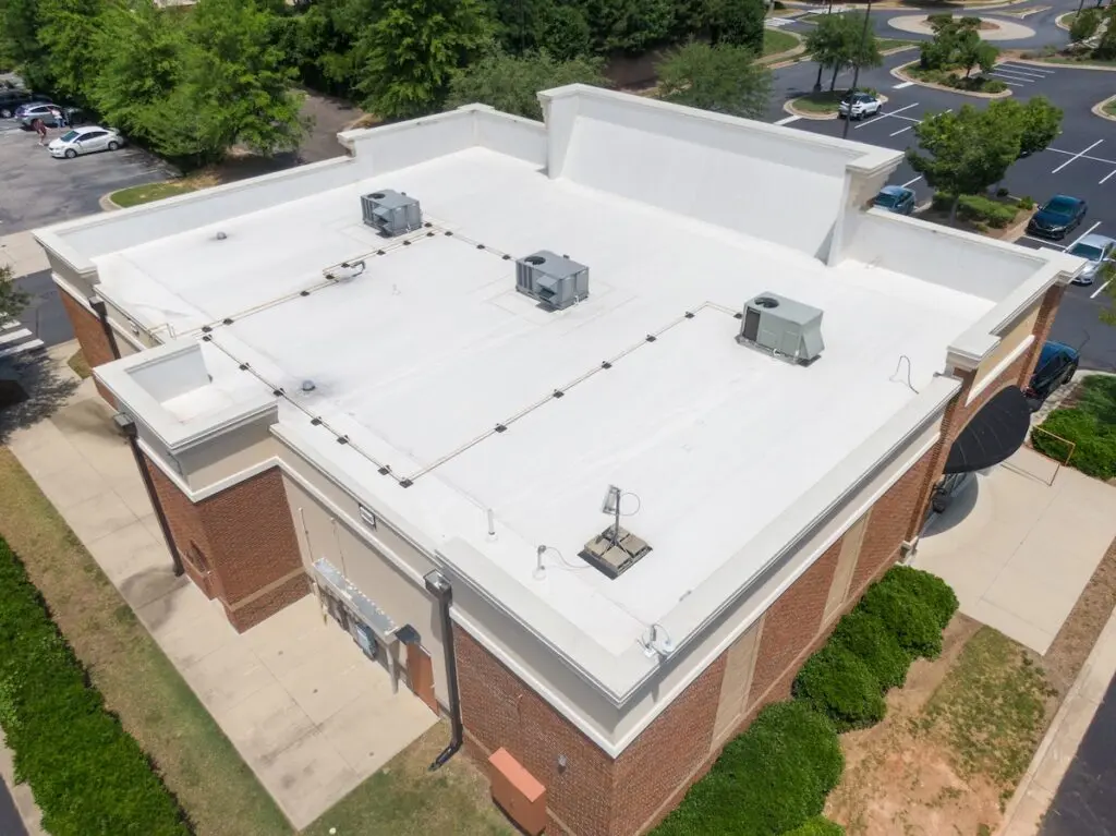 Drone Images of Commercial Roofs Featuring TPO and Asphalt Shingles: Midday, Sunny, No People