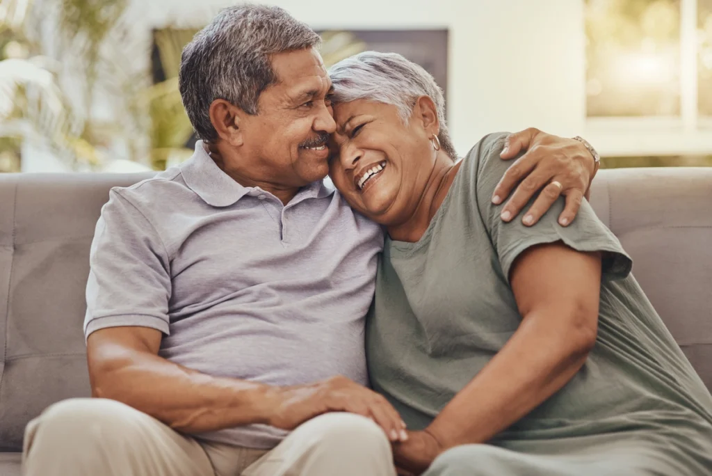 loving homeowner senior couple at home