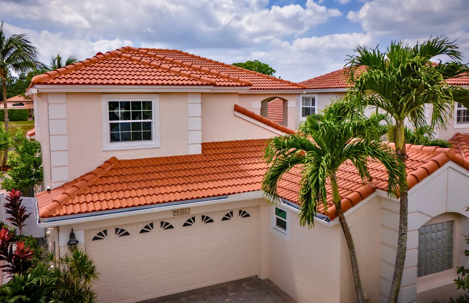 Distinctive Roofing - Orange roof Westlake estate Canyon clay
