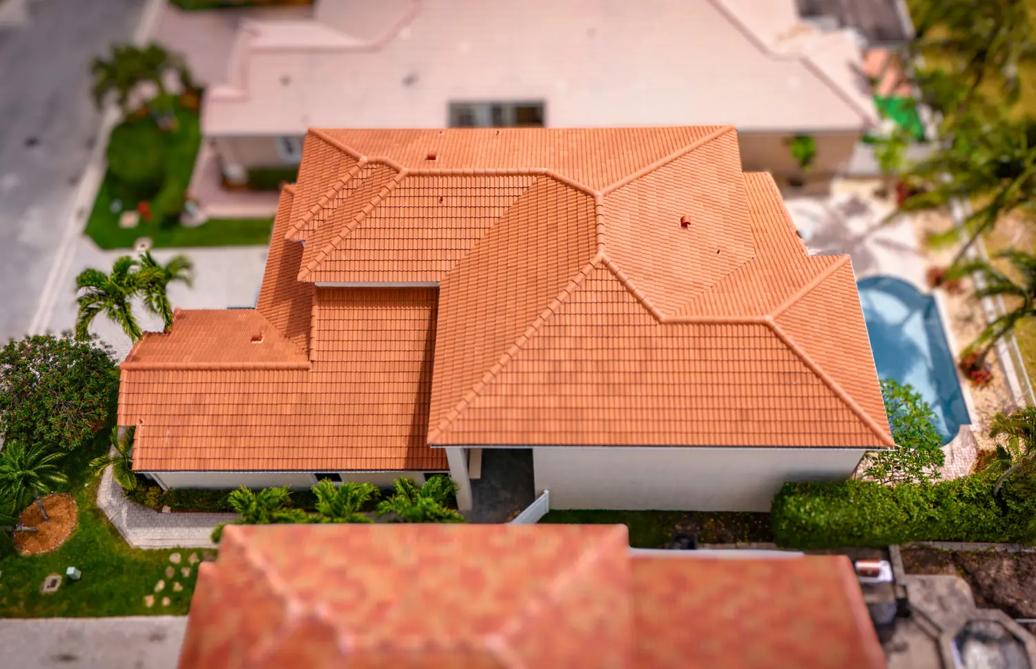 Distinctive Roofing - Orange roof Westlake estate miniature
