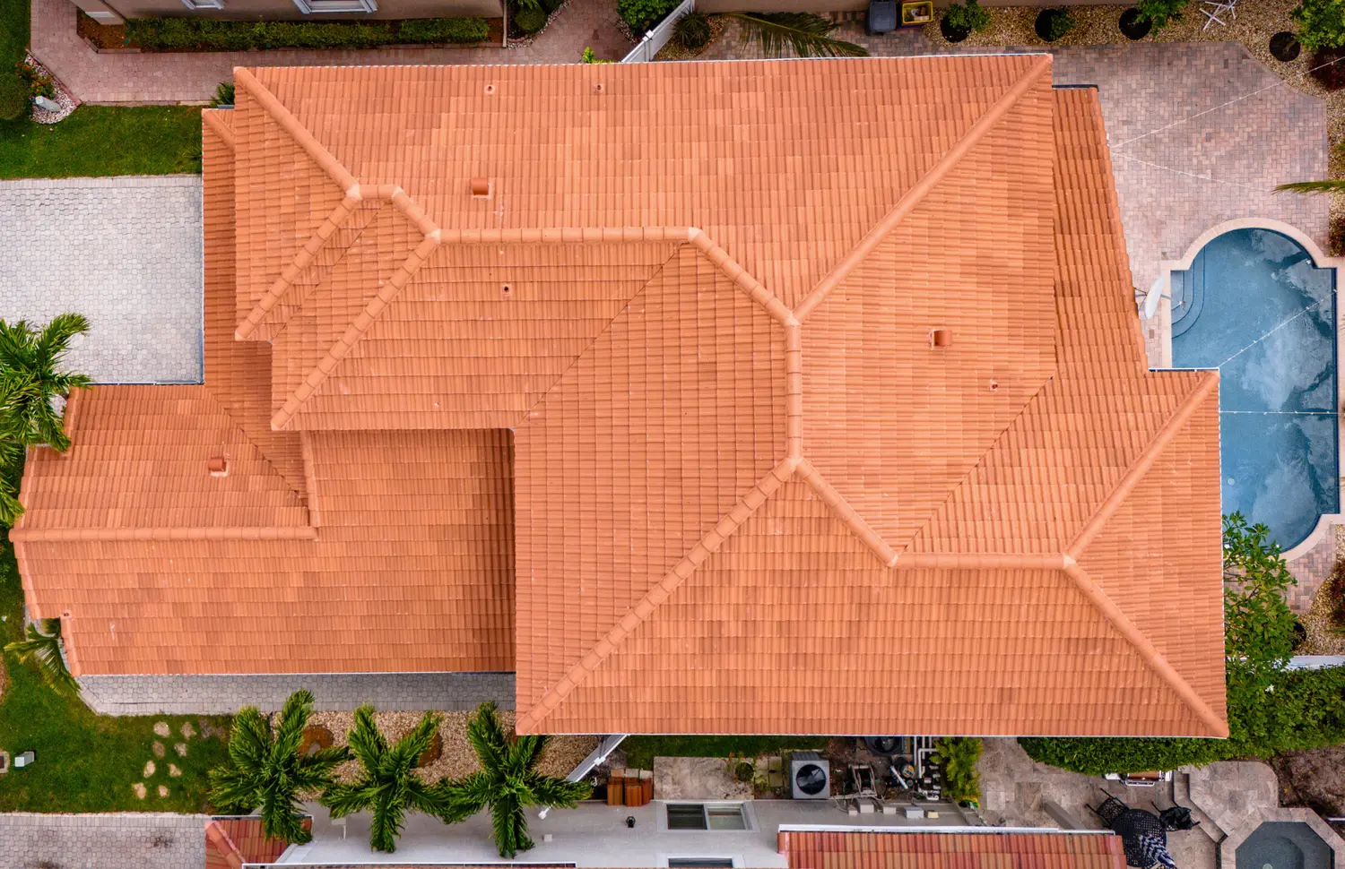 Distinctive Roofing - Orange roof Westlake estate