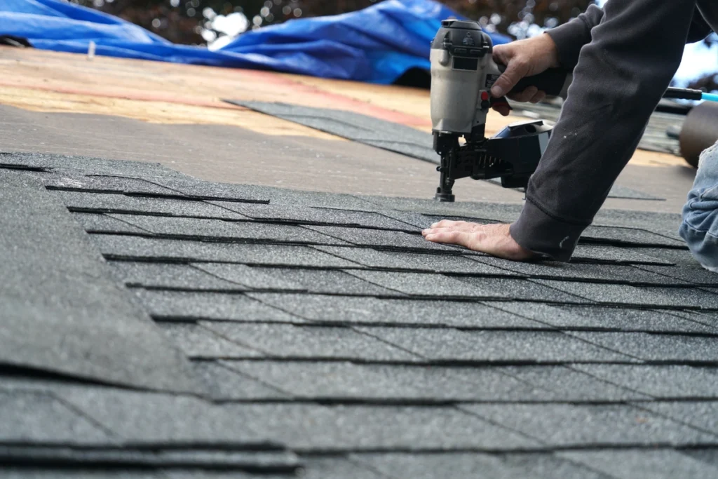 Distinctive Roofing - Nail gun roof shingles