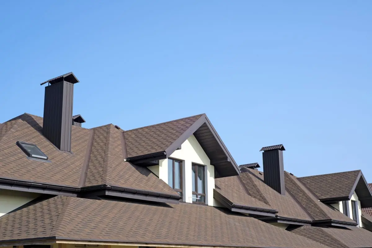 Minneapolis home with K-style gutters along the eaves — the standard residential profile for most Minnesota homes