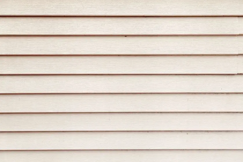 Slice the white siding on old house