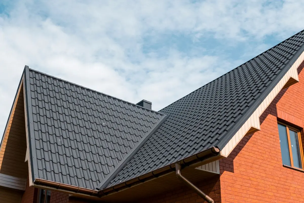 brick house with metal tile roof, White Bear Lake