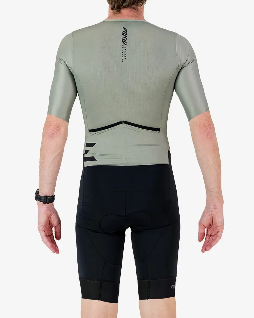 Back view of the men's sleeved triathlon suit in a green and black design made by enjoy.cc