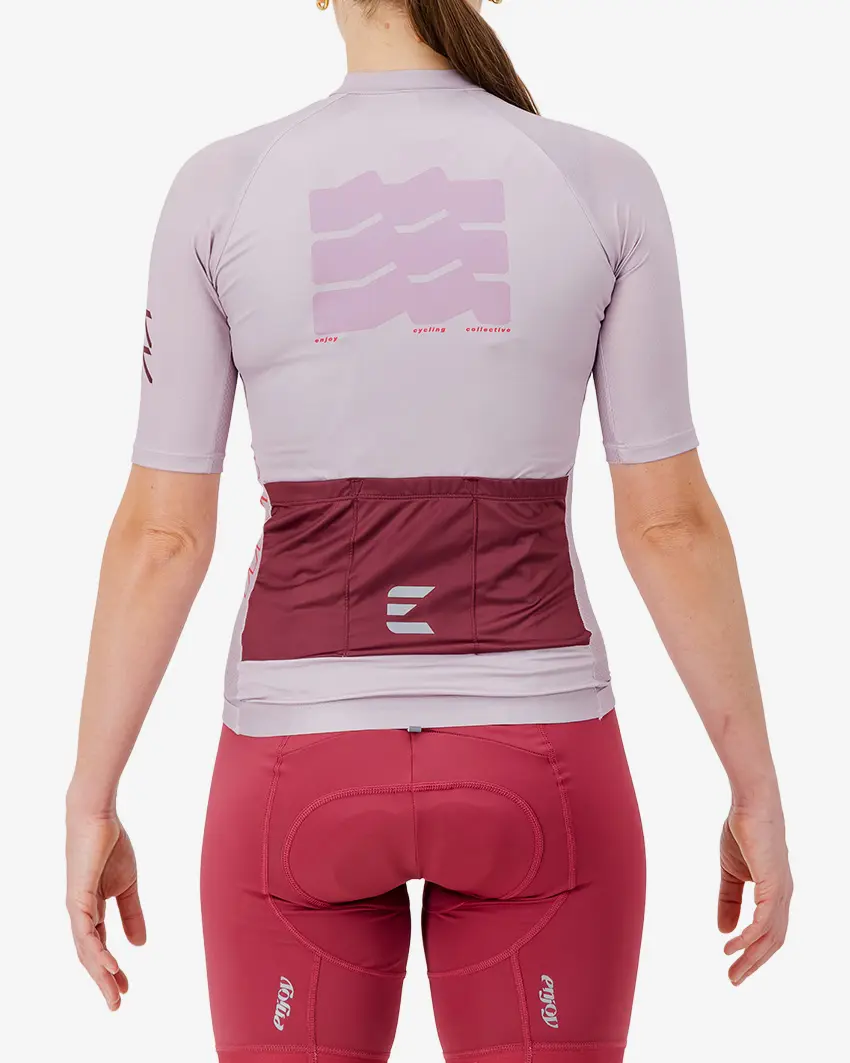 Back view of the Women's Supremium cycling jersey for in mauve colour way by enjoy.cc