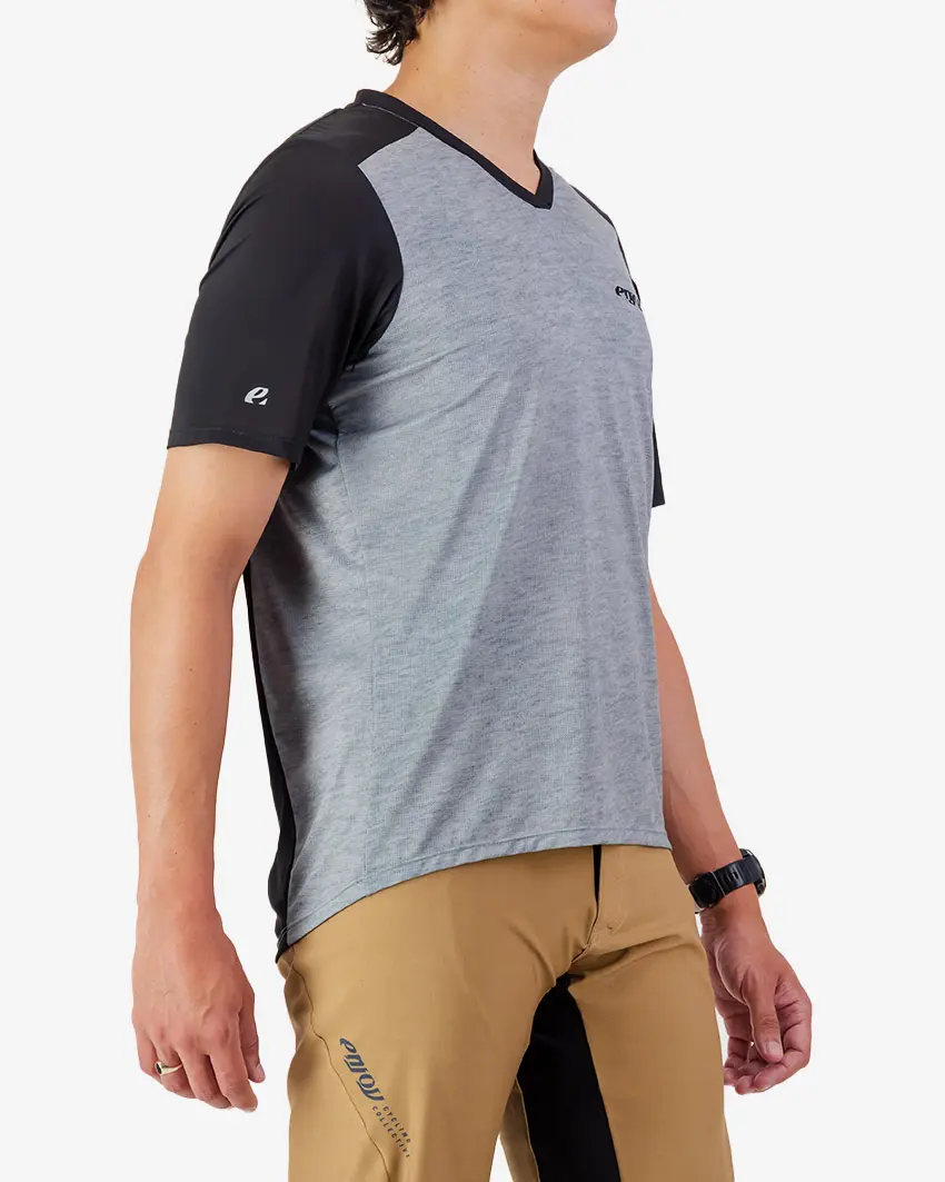 Side view of the Enjoy men's Enduro Trail Tee in black with reflective detailing made by Enjoy.cc