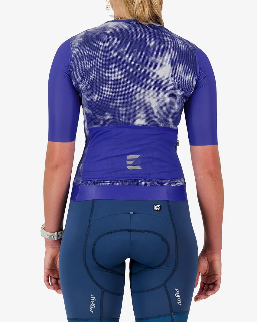 Back view of the ProXision women's zipless cycling jersey in a blue tie-dye design made by enjoy.cc