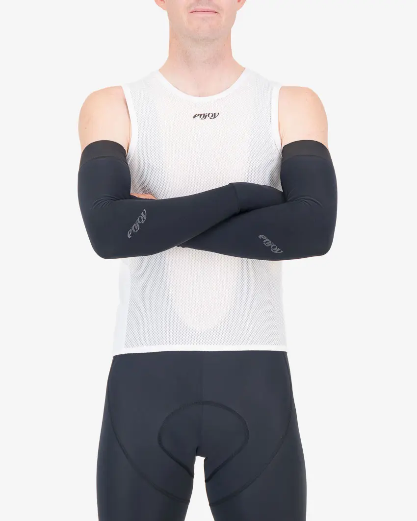 Front view of the mens fleeced cuffed armwarmer with riders arms folded showing reflective detailing made by Enjoy.cc