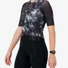 Side view of the ProXision women's cycling jersey in a greyscale tie-dye design made by enjoy.cc