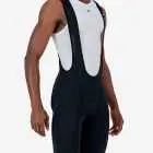 Side view of the Enjoy Octane men's bib short in black with reflective detail made by Enjoy.cc