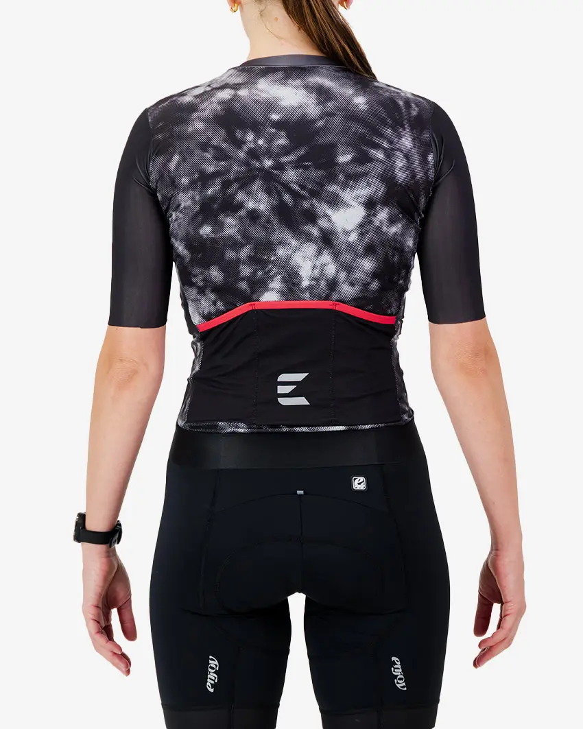 Back view of the ProXision women's cycling jersey in a greyscale tie-dye design made by enjoy.cc