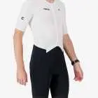 Side view of the men's sleeved triathlon suit in a black and white design made by enjoy.cc