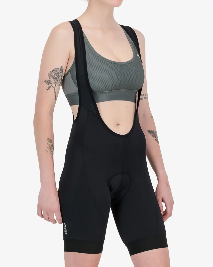 Three quarter view of the black dual womens bib short part of the Enjoy cycling apparel range.