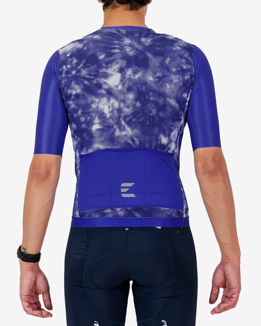 Back view of the ProXision men's zipless cycling jersey in a blue tie-dye design made by enjoy.cc