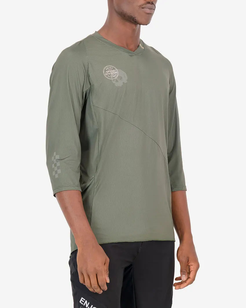 Three quarter view of the Enjoy mens enduro tee in the peat Evade design. Part of Reptilia trail range designed by enjoy.cc