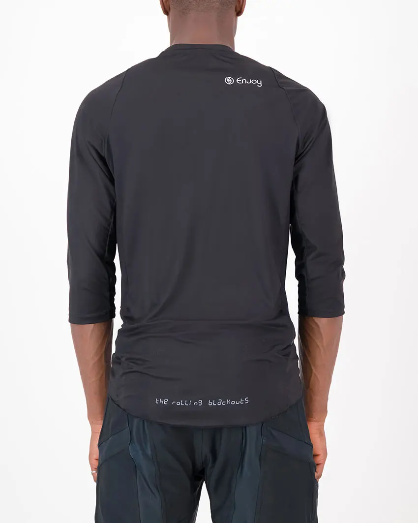 Back view of the Enjoy mens enduro tee in the Rolling Blackouts design. Part of Reptilia trail range designed by enjoy.cc