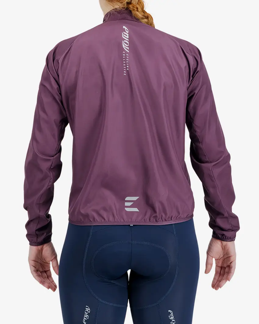 Back view of the Atom women's cycling jacket in a rich Berry colour way by Enjoy.cc