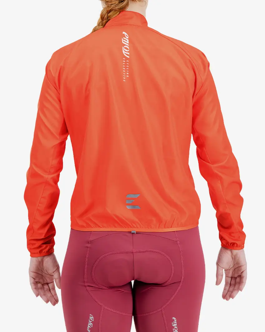 Back view of the Atom women's cycling jacket in a high-visibility Flame colour way by Enjoy.cc