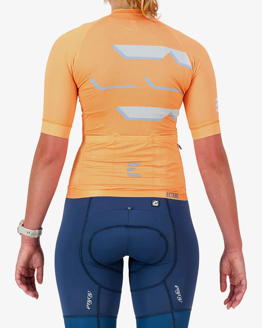 Back view of the Octane women's cycling jersey in a orange chevron design made by enjoy.cc