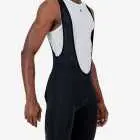 Side view of the Enjoy Dual men's bib short in black with reflective detailing made by enjoy.cc.