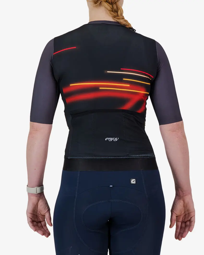 Back view of the ProXision women's cycle jersey in dark Lightspeed design made by enjoy.cc