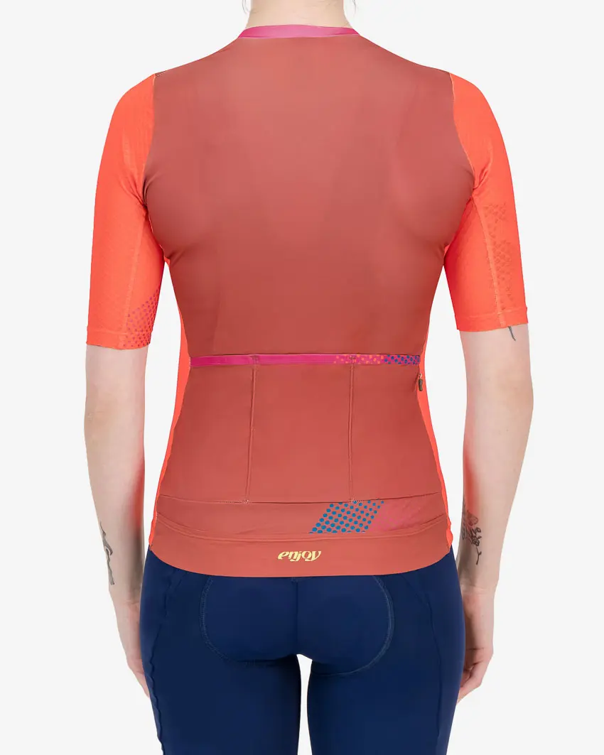 Back view of the Enjoy ProXision womens cycling jersey in the Ascendant orange design from Enjoy.cc