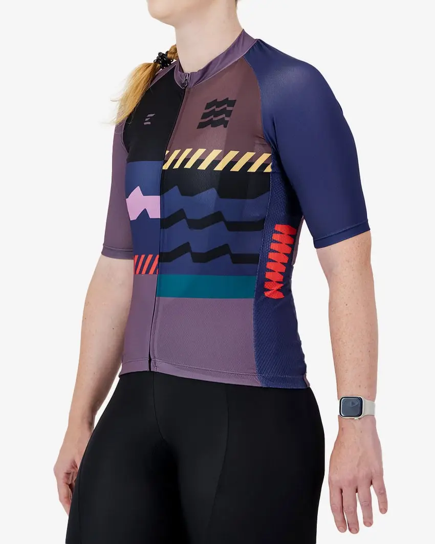 Left side view of the Supremium Womens cycling jersey in the Dark Geom design by Enjoy.cc